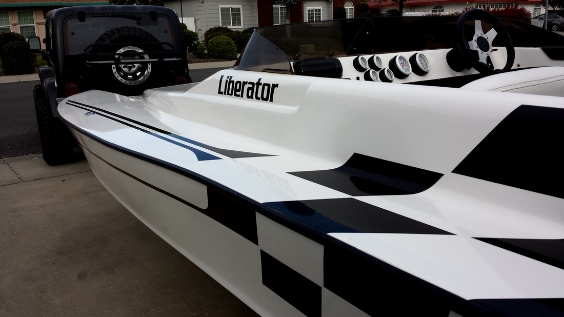 detail pros in colusa doing an oxidation removal and polishing on an eliminator pickle fork boat